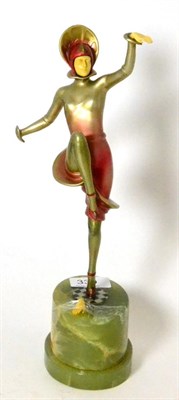 Lot 339 - Art Deco spelter and cold painted figure modelled as a dancer, in the manner of Lorenzl, on a green