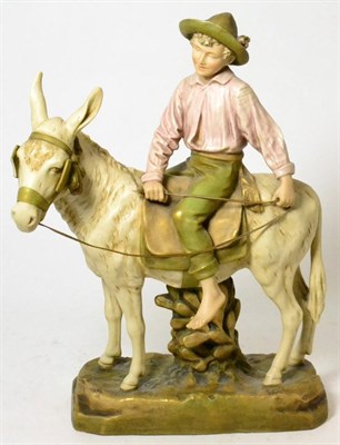 Lot 343 - A Royal Dux boy riding a donkey, marks to base (slight loss to blinker)