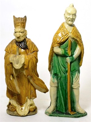 Lot 361 - A Chinese pottery statue of a Daoist sage, 19th century, and a Chinese sancai pottery figure of...