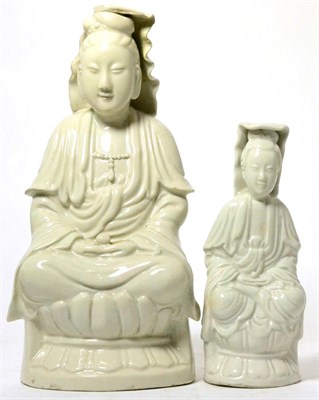 Lot 367 - A Chinese blanc-de-chine figure of Guanyin and a smaller similar figure, both 19th century