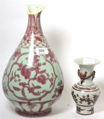 Lot 369 - A large Chinese underglaze red porcelain pear shaped vase and an underglaze red baluster vase