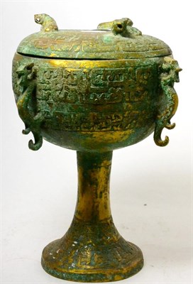 Lot 373 - A Chinese gilt bronze dou vessel and cover