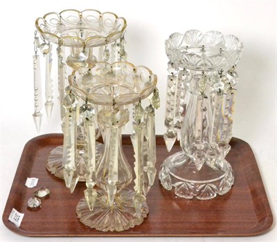 Lot 379 - Three 19th century clear glass table lustres