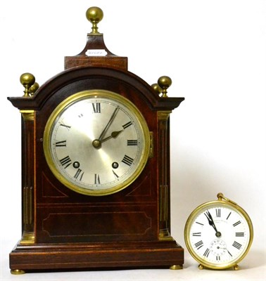 Lot 385 - A quarter striking mantel clock and a small striking brass timepiece, the dial signed Wilson &...