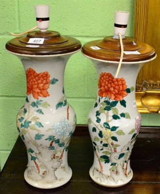 Lot 407 - Two ceramic lamp bases (one with repairs)