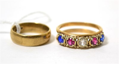 Lot 433 - A 9ct gold band ring and a gem set ring, stamped '14K' (2)