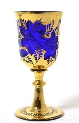 Lot 444 - A 19th century gilt and blue flash glass goblet