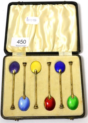 Lot 450 - A cased set of silver and enamel seal top spoons