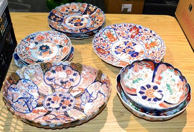 Lot 1024 - A group of nine 19th century Japanese Imari lobed dishes, bowls and plates (most a.f)