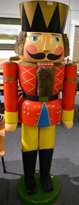 Lot 1035 - A full size wooden soldier from the Nutcracker, made in Germany, previously displayed at...