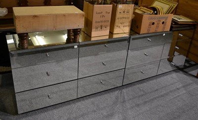 Lot 1047 - A pair of mirrored chests of drawers retailed by Next, together with a box stool in need of...