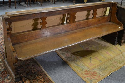 Lot 1052 - Sir George Gilbert Scott (1811-1878): A Gothic revival oak pew, 210cm long  Installed in the...