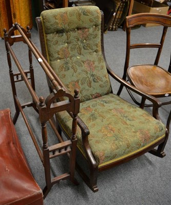 Lot 1097 - Upholstered rocking armchair and Victorian towel rail (2)