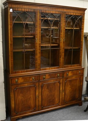 Lot 1099 - A Bevan Funnell glazed bookcase cabinet