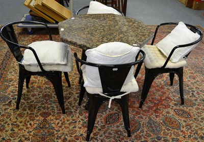 Lot 1102 - A reproduction painted cast iron table with octagonal marble top and four chairs