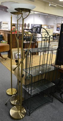 Lot 1156 - A painted metal four tier plant stand together with three modern up lighters