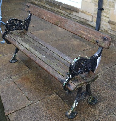 Lot 1190 - A Victorian cast iron ended, slatted wooden garden bench