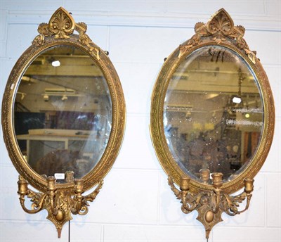 Lot 1205 - A pair of 19th century gilt and gesso three branch girandole, height 94cm