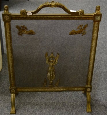 Lot 1211 - Gilt brass fire screen in Empire style