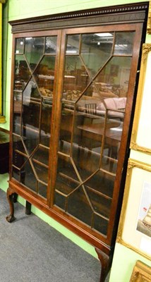 Lot 1275 - A 19th century mahogany astragal glazed bookcase on stand