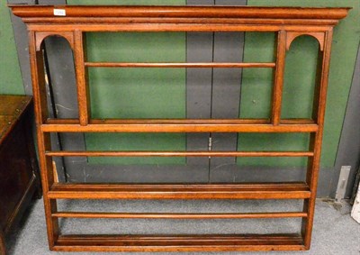 Lot 1282 - A 19th century oak wall rack