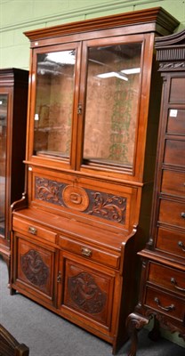 Lot 1290 - Late Victorian carved mahogany bookcase secretaire with glazed upper section above a fore front