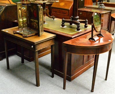 Lot 1299 - A George III mahogany demi-lune foldover card table, a George III mahogany rectangular foldover tea