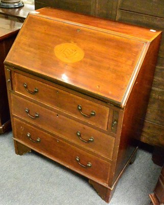 Lot 1311 - An Edwardian mahogany, satinwood banded and shell inlaid small bureau