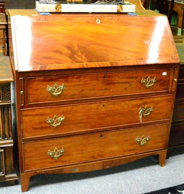 Lot 1315 - An inlaid mahogany bureau