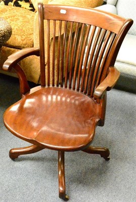 Lot 1329 - A late 19th/early 20th century swivel office chair