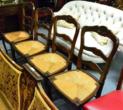 Lot 1339 - A set of four reproduction oak dining chairs