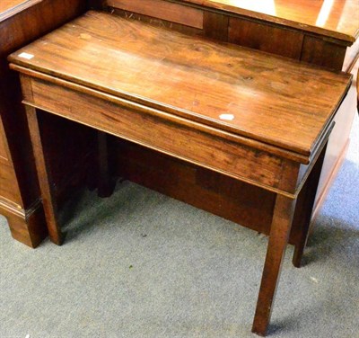 Lot 1356 - George III mahogany fold over tea table