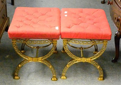 Lot 1359 - Pair of brass framed buttoned stools