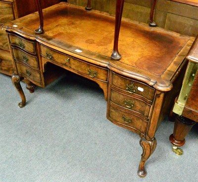 Lot 1361 - Reproduction leather inset walnut writing desk