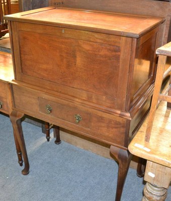 Lot 1378 - A mahogany drinks cabinet with hinged top and fall front on cabriole supports