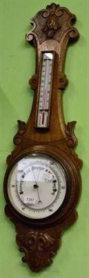 Lot 1387 - An oak aneroid barometer