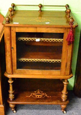 Lot 1391 - A 19th century satinwood inlaid walnut music cabinet moving on castors