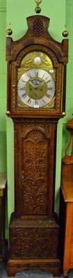 Lot 1393 - A carved oak eight day longcase clock, dial bearing a later inscription John Pattison, Halifax