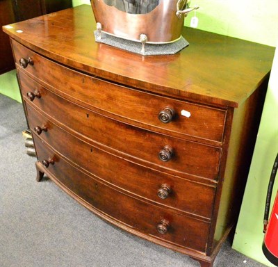 Lot 1395 - A George III mahogany bow fronted four height chest of drawers