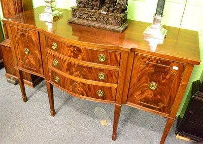 Lot 1398 - A mahogany bow fronted sideboard