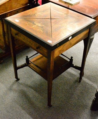 Lot 1411 - A late Victorian envelope card table in marquetry and rosewood, stamped Maple &amp; Co