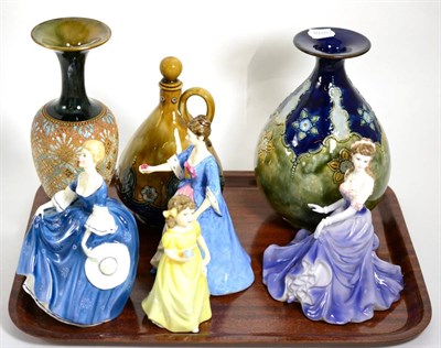 Lot 9 - Two Royal Doulton stoneware vases, a jug, three Royal Doulton figures and a Coalport figure