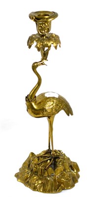 Lot 18 - A Regency style gilt brass candlestick in the form of a crane with crown, naturalistic base, single