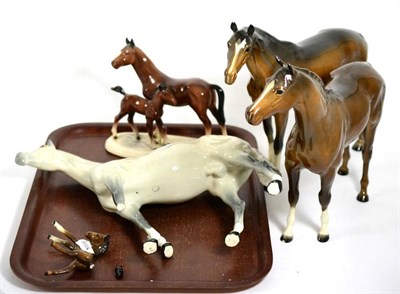 Lot 39 - Collection of Beswick horses (with damage), plus one mare and foal (broken parts present)