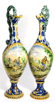 Lot 42 - A pair of Cantagalli style slender ewers, 42cm high