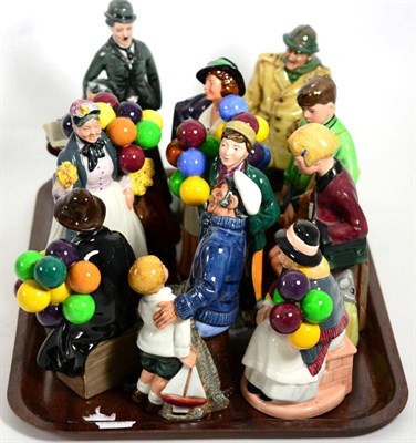 Lot 49 - A group of eleven Royal Doulton figures including The Boy Evacuee 3069/9500; Charlie Chaplin...