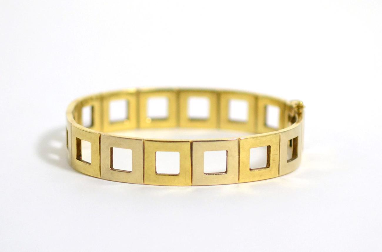 Lot 56 - A two colour bangle