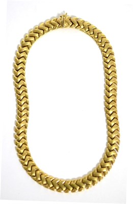 Lot 63 - A fancy link necklace, stamped '375'