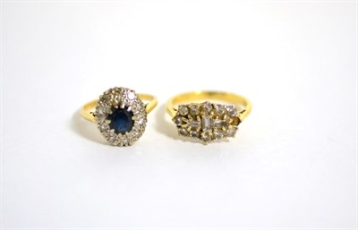 Lot 70 - A sapphire and diamond cluster ring, stamped '18CT PLAT', finger size L1/2 and an 18 carat gold...