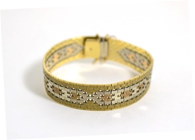 Lot 90 - A tri-coloured bracelet, stamped '9K'